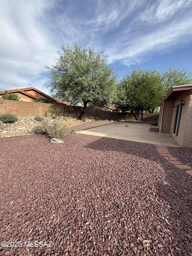 5640 N Placita Favorita, Tucson, AZ 85750 - fenced backyard featuring a patio