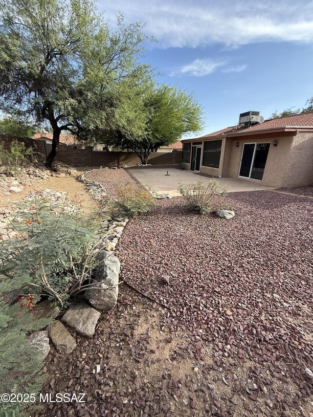 5640 N Placita Favorita, Tucson, AZ 85750 - fenced backyard featuring a patio area and cooling unit