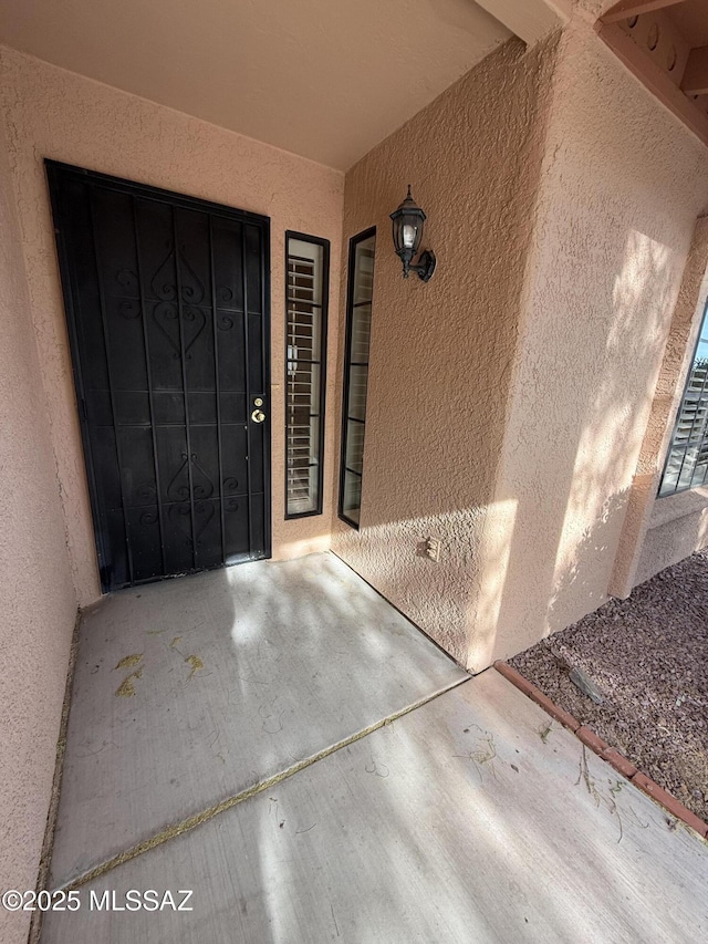 5640 N Placita Favorita, Tucson, AZ 85750 - view of exterior entry featuring stucco siding
