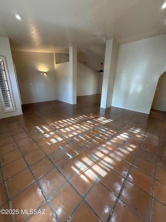 5640 N Placita Favorita, Tucson, AZ 85750 - empty room featuring lofted ceiling, ceiling fan, recessed lighting, and arched walkways