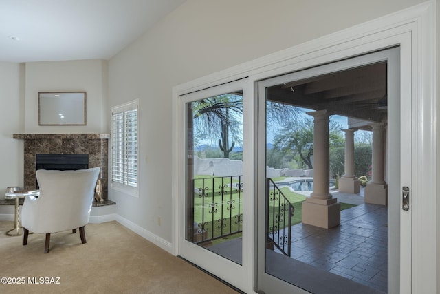 3750 E Sumo Quinto, Tucson, AZ 85718 - entryway featuring a premium fireplace, baseboards, and carpet flooring