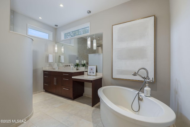 3750 E Sumo Quinto, Tucson, AZ 85718 - bathroom with vanity, a freestanding tub, baseboards, tile patterned flooring, and recessed lighting