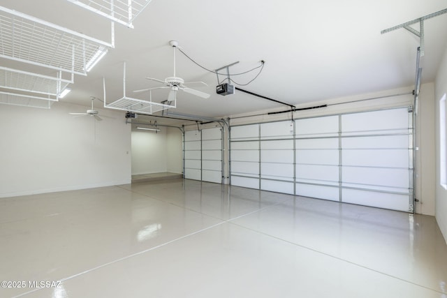 3750 E Sumo Quinto, Tucson, AZ 85718 - garage featuring a ceiling fan and a garage door opener