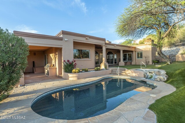 3750 E Sumo Quinto, Tucson, AZ 85718 - outdoor pool with a ceiling fan, a patio area, and a lawn