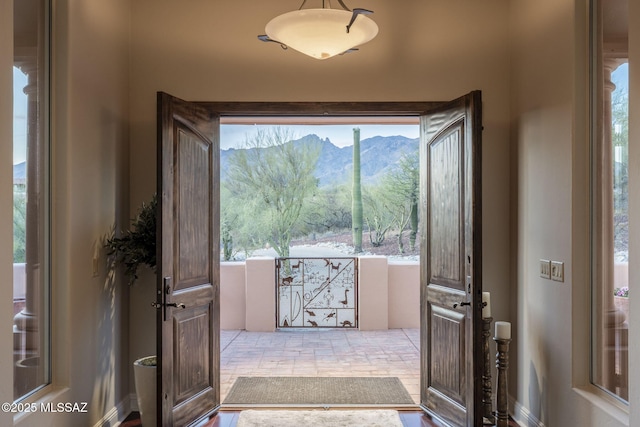 3750 E Sumo Quinto, Tucson, AZ 85718 - foyer with healthy amount of natural light and a mountain view