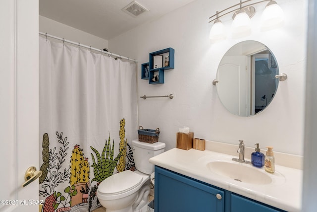 7511 W Sweet River Rd, Tucson, AZ 85743 - bathroom with toilet, vanity, and a shower with shower curtain