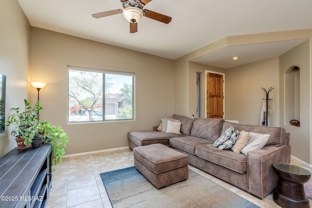 7511 W Sweet River Rd, Tucson, AZ 85743 - tiled living room featuring ceiling fan and baseboards