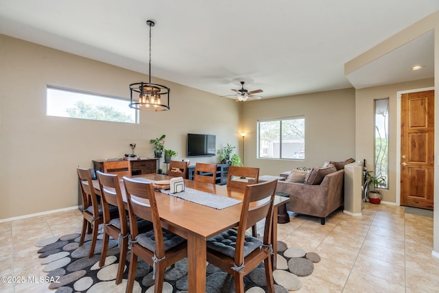 7511 W Sweet River Rd, Tucson, AZ 85743 - dining room with light tile patterned floors, baseboards, a ceiling fan, a chandelier, and recessed lighting