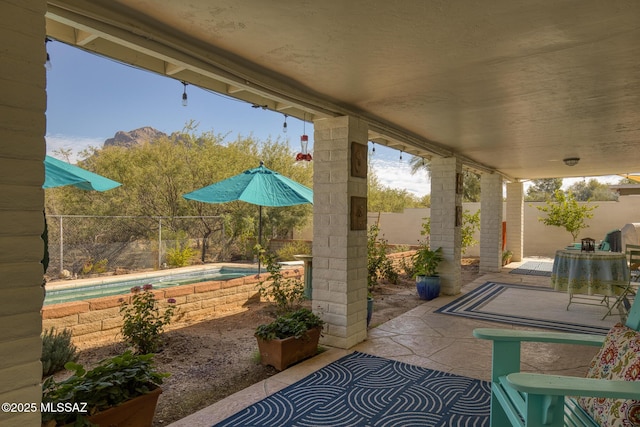 8628 N Placita Del Cardo, Tucson, AZ 85704 - fenced backyard with a patio area