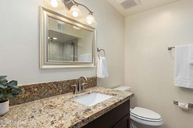 8628 N Placita Del Cardo, Tucson, AZ 85704 - bathroom featuring toilet, vanity, and a shower