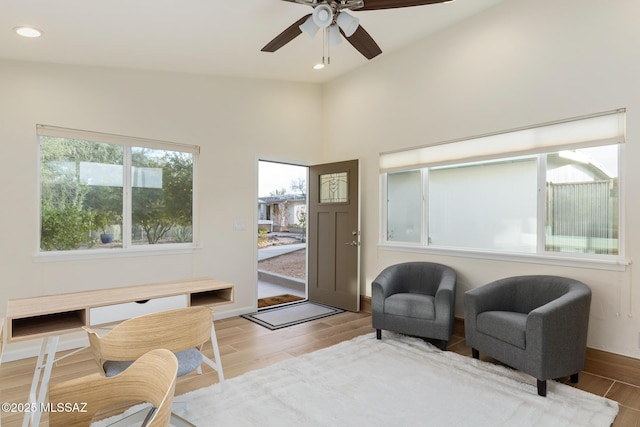 8628 N Placita Del Cardo, Tucson, AZ 85704 - living area with wood finished floors, a ceiling fan, recessed lighting, and baseboards