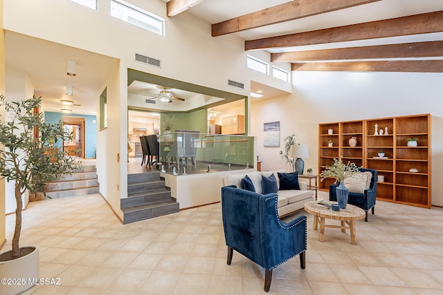 1900 E Campbell Ter, Tucson, AZ 85718 - living room with a high ceiling, a ceiling fan, beam ceiling, and stairs