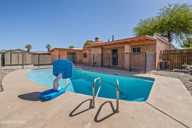 1716 S Sleepy Hollow Ave, Tucson, AZ 85710 - view of swimming pool with a patio