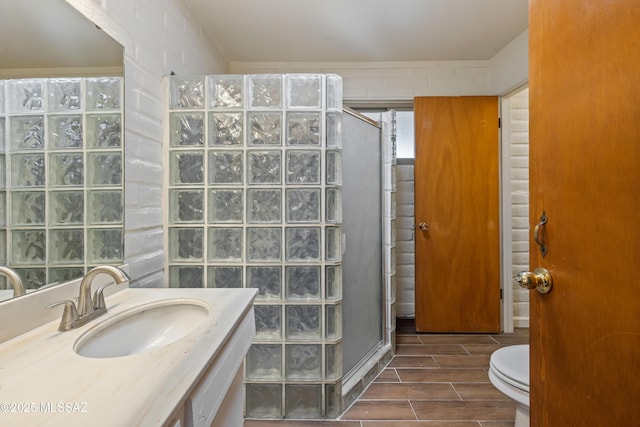 1716 S Sleepy Hollow Ave, Tucson, AZ 85710 - full bathroom with a shower stall, vanity, toilet, and wood tiled floors