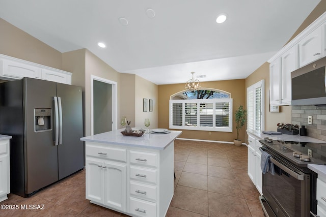 37358 S Ridgeview Blvd, Saddlebrooke, AZ 85739 - kitchen with stainless steel appliances, light countertops, light tile patterned floors, and recessed lighting