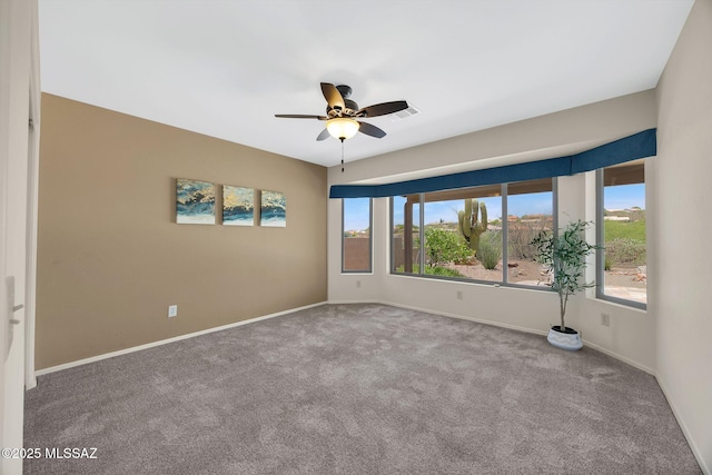 37358 S Ridgeview Blvd, Saddlebrooke, AZ 85739 - spare room featuring carpet, a ceiling fan, and baseboards