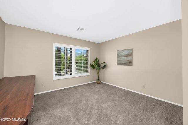 37358 S Ridgeview Blvd, Saddlebrooke, AZ 85739 - empty room featuring carpet floors and baseboards