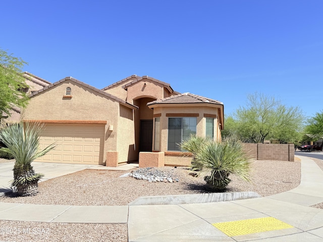 1320 W Bloomington Pl, Tucson, AZ 85755 - view of front of home with a garage, stucco siding, concrete driveway, and a tiled roof
