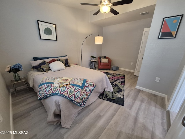230 N Biddle Ave, Willcox, AZ 85643 - bedroom featuring wood finished floors, baseboards, and ceiling fan