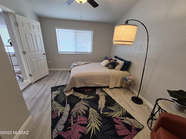 230 N Biddle Ave, Willcox, AZ 85643 - bedroom featuring wood finished floors, baseboards, and ceiling fan