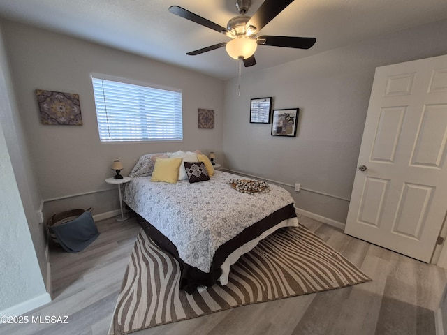230 N Biddle Ave, Willcox, AZ 85643 - bedroom with light wood-style floors, baseboards, and a ceiling fan