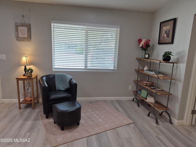 230 N Biddle Ave, Willcox, AZ 85643 - sitting room with wood finished floors and baseboards
