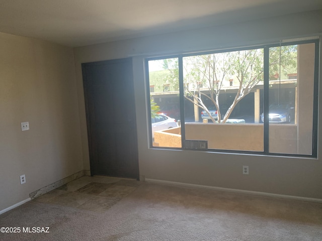 8271 N Oracle Rd Unit 146, Tucson, AZ 85704 - unfurnished room with carpet and baseboards