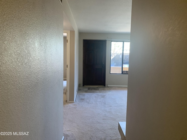 8271 N Oracle Rd Unit 146, Tucson, AZ 85704 - hallway featuring a textured wall and carpet flooring