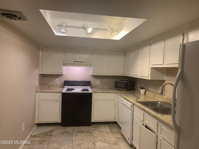 8271 N Oracle Rd Unit 146, Tucson, AZ 85704 - kitchen with white dishwasher, stainless steel microwave, light countertops, and white cabinetry