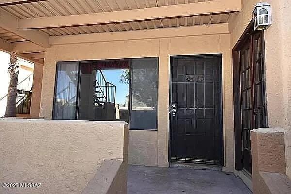 8271 N Oracle Rd Unit 146, Tucson, AZ 85704 - view of exterior entry featuring stucco siding