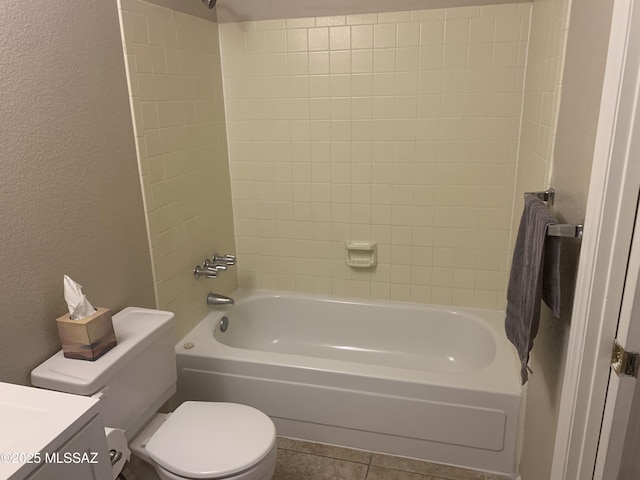 8271 N Oracle Rd Unit 146, Tucson, AZ 85704 - bathroom featuring a textured wall, vanity, washtub / shower combination, and tile patterned floors