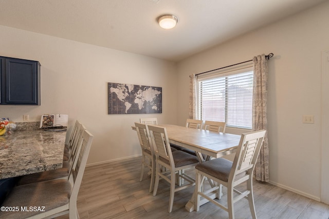 13218 E Mineta Ridge Dr, Vail, AZ 85641 - dining room featuring light wood-style floors