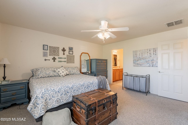 13218 E Mineta Ridge Dr, Vail, AZ 85641 - bedroom with light carpet, a ceiling fan, and ensuite bathroom