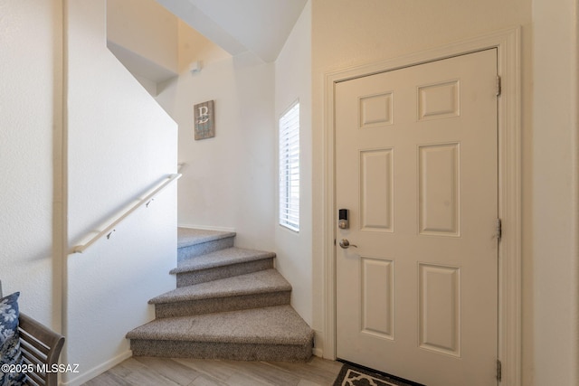 13218 E Mineta Ridge Dr, Vail, AZ 85641 - foyer entrance with stairs and light wood-style flooring