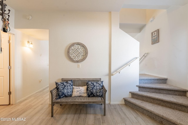 13218 E Mineta Ridge Dr, Vail, AZ 85641 - sitting room featuring light wood-style floors and stairs