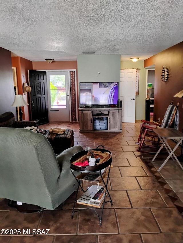 242 N Sage St, Pearce, AZ 85625 - living room with a textured ceiling
