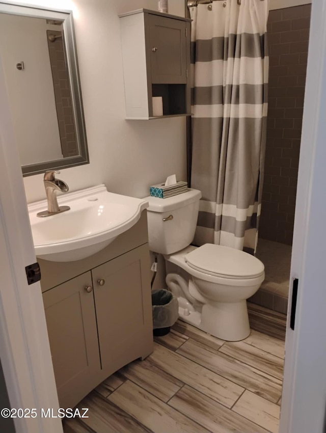 242 N Sage St, Pearce, AZ 85625 - full bath with vanity, a stall shower, and wood finished floors