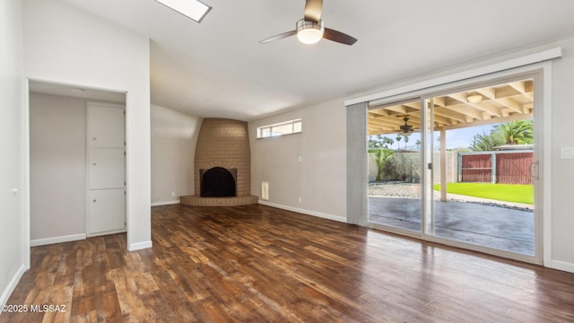 5701 E Waverly St, Tucson, AZ 85712 - unfurnished living room featuring ceiling fan, wood finished floors, healthy amount of natural light, and lofted ceiling
