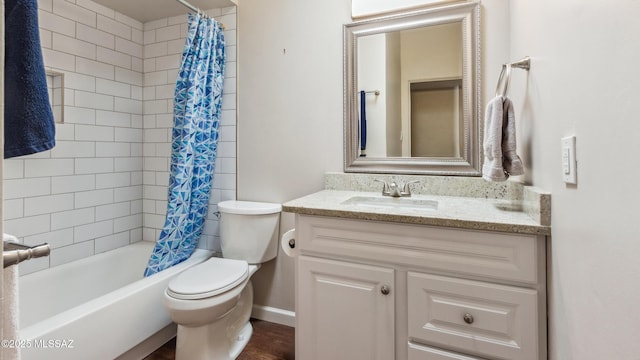 5701 E Waverly St, Tucson, AZ 85712 - full bath with vanity, toilet, shower / bath combo, and baseboards