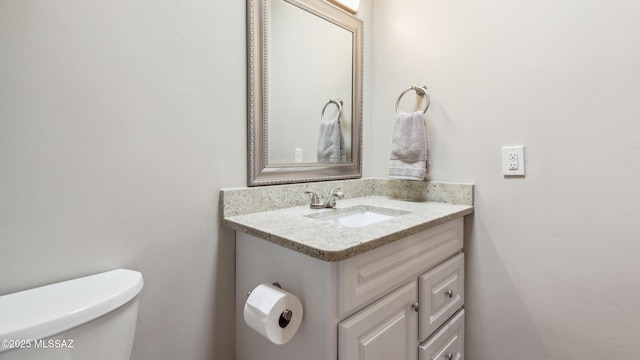 5701 E Waverly St, Tucson, AZ 85712 - bathroom featuring toilet and vanity