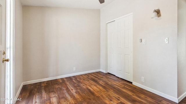 5701 E Waverly St, Tucson, AZ 85712 - empty room with dark wood-type flooring, a ceiling fan, and baseboards