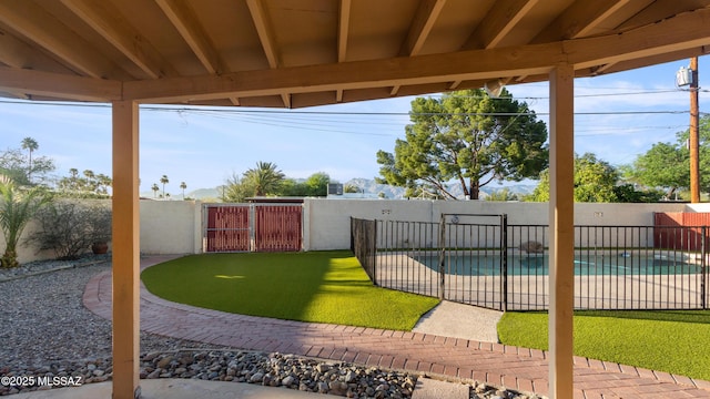 5701 E Waverly St, Tucson, AZ 85712 - view of pool featuring a fenced backyard and a patio
