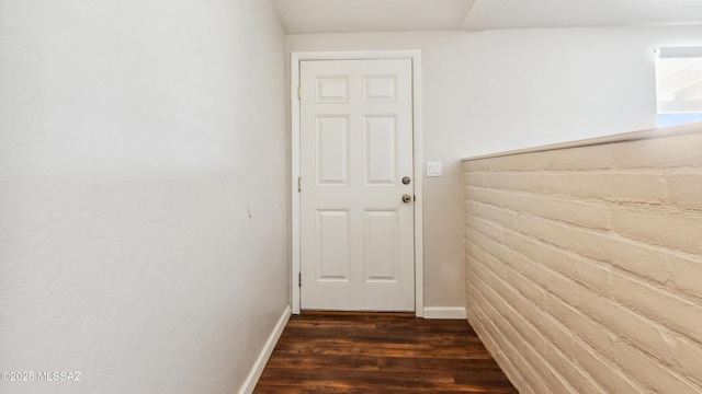 5701 E Waverly St, Tucson, AZ 85712 - corridor featuring dark wood-style flooring and baseboards