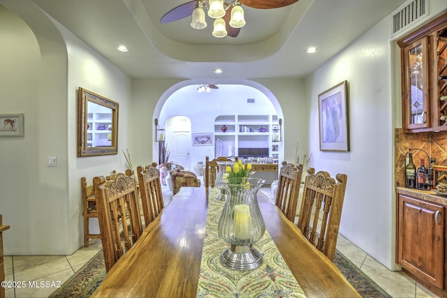 2460 N Cavalry Trl, Tucson, AZ 85749 - dining area featuring recessed lighting, a ceiling fan, arched walkways, and light tile patterned flooring