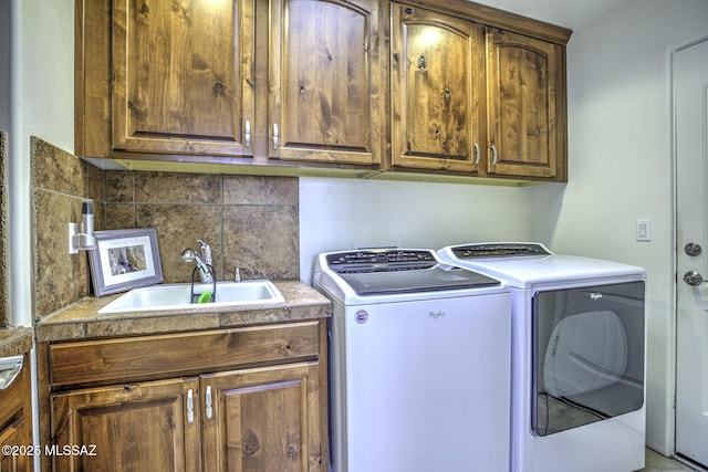 2460 N Cavalry Trl, Tucson, AZ 85749 - laundry area featuring cabinet space and washer and clothes dryer