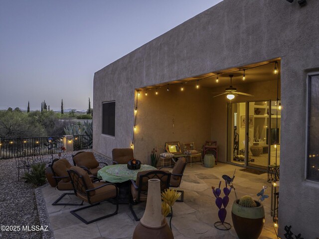 2460 N Cavalry Trl, Tucson, AZ 85749 - view of patio / terrace with a ceiling fan and outdoor dining area