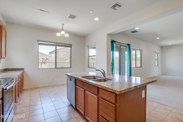 13391 N Flaxleaf Pl, Oro Valley, AZ 85755 - kitchen with appliances with stainless steel finishes, a sink, light tile patterned floors, open floor plan, and plenty of natural light