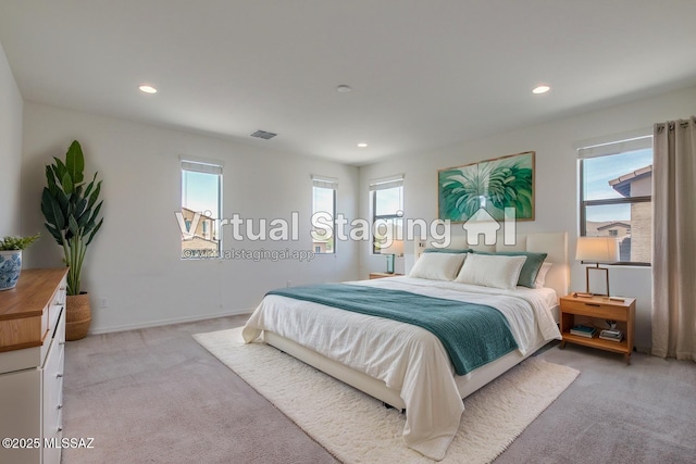 13391 N Flaxleaf Pl, Oro Valley, AZ 85755 - bedroom featuring light carpet, recessed lighting, and baseboards