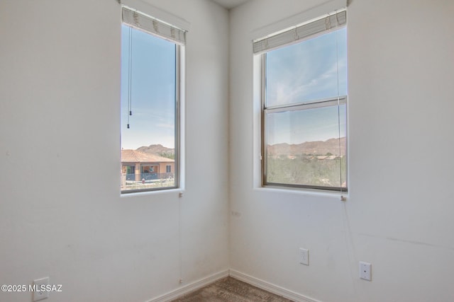 13391 N Flaxleaf Pl, Oro Valley, AZ 85755 - unfurnished room featuring baseboards