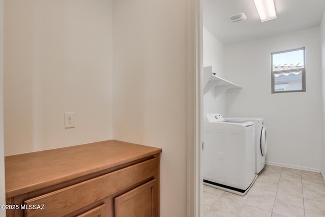 13391 N Flaxleaf Pl, Oro Valley, AZ 85755 - laundry room featuring washer and dryer, light tile patterned floors, and baseboards